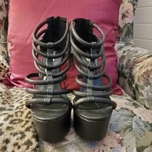 Black gladiator platform stilettos